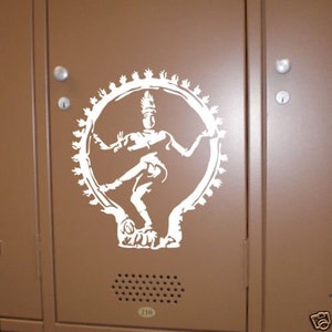 May include: A brown locker door with a white graphic of a dancing figure within a circular frame. The locker has a handle, a keyhole, and the number 210 on the bottom.