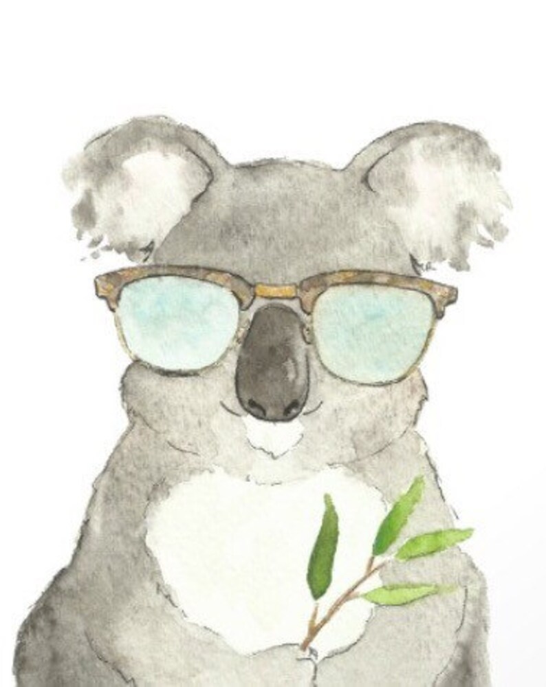 May include: Watercolor illustration of a koala wearing glasses and holding a sprig of leaves. The koala is gray with a brown nose and ears. The glasses have a brown frame and light blue lenses. The leaves are green.