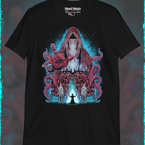 May include: Black t-shirt with a graphic print of a hooded figure with a red hand and multiple eyes. The figure is surrounded by tentacles and a triangle with a glowing blue background. The text "Midnight Monster" is printed on the shirt.