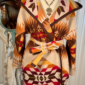 Large earth tone ‘famous maker’ wool coat with hood upcycled from new with tags ‘famous maker’ wool blanket.  Please read description