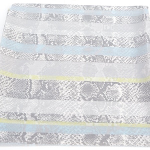 May include: A folded textile with a repeating pattern of horizontal stripes. The stripes alternate between a snakeskin print in shades of gray and solid bands of light blue and pale yellow. The fabric has a soft, flowing appearance.