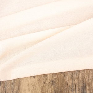 Pale Peach Crepe Knit Fabric: Lightweight Rayon Blend, 2-Way Stretch