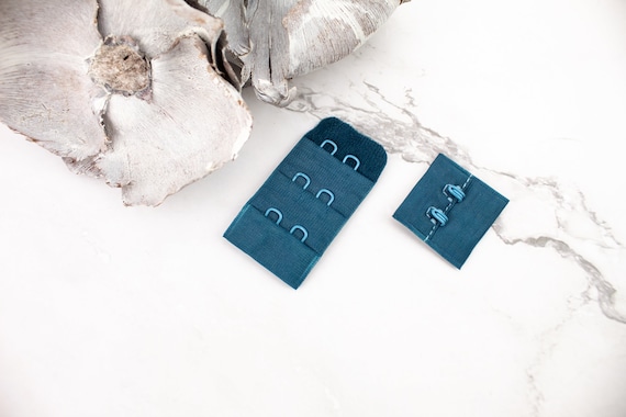 Cierre de sujetador con gancho y ojal color verde azulado x