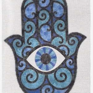 May include: A blue and black hamsa hand with a blue eye in the center. The hamsa is a symbol of protection and good luck.