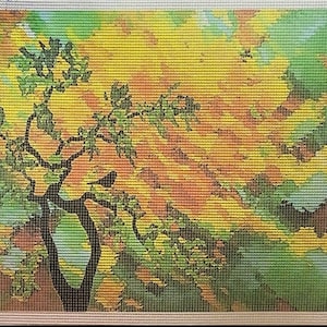 May include: A painting of a tree with yellow, orange, and green leaves against a blue sky. The tree is silhouetted against the sky, and the leaves are painted in a loose, impressionistic style.