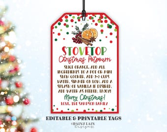 May include: A red and white tag with the text "STOVETOP Christmas Potpourri" and instructions for making potpourri. The tag features illustrations of orange slices, cinnamon sticks, and berries. The tag is designed for Christmas.