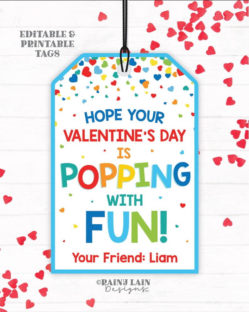 Puede incluir: Una etiqueta de regalo para el D&iacute;a de San Valent&iacute;n, imprimible, azul y blanca, con corazones y confeti de colores. La etiqueta dice "&iexcl;Espero que tu D&iacute;a de San Valent&iacute;n est&eacute; lleno de diversi&oacute;n!" y "Tu amigo: Liam".