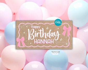 May include: A rectangular sign with the words "Happy Birthday HANNAH" in white script, framed by a pink border and bows. The sign is set against a backdrop of pastel pink, blue, and white balloons.