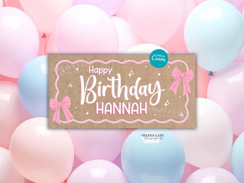 May include: A rectangular sign with the words "Happy Birthday HANNAH" in white script, framed by a pink border and bows. The sign is set against a backdrop of pastel pink, blue, and white balloons.