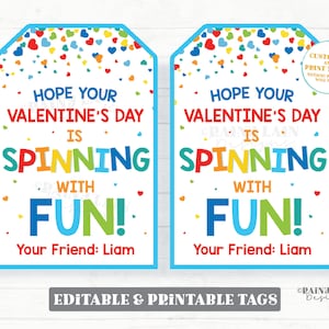 May include: Two printable Valentine's Day gift tags with a colorful confetti background and the text "Hope your Valentine's Day is spinning with fun!"  The tags are blue and white with a rainbow colored "spinning" and "fun" text.  The text "Your Friend: Liam" is at the bottom of each tag.