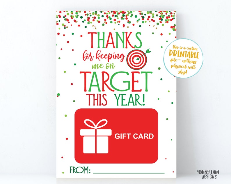 May include: A printable gift card template featuring a red and green target design. The text reads "Thanks for keeping me on target this year!" and includes a space for a gift card amount and a "from" line.