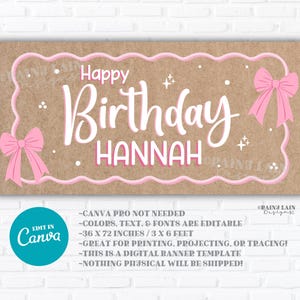 May include: A rectangular banner with a brown background and pink accents. The banner reads "Happy Birthday Hannah" in white script. Pink bows are on each side. The banner is 91 x 183 cm.