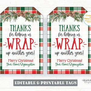 May include: Two printable gift tags with a red and green plaid background. The tags feature a watercolor illustration of a pine branch with pine cones and the text "THANKS for helping us WRAP up another year! Merry Christmas! Your Name/Organization".