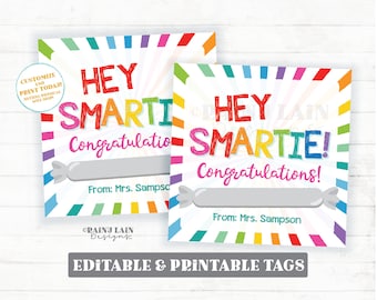 May include: Two printable gift tags with a rainbow striped border. The tags feature the text "Hey Smartie! Congratulations!" with a blank space for a name and the text "From: Mrs. Sampson".