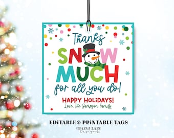May include: A printable gift tag with a snowman design and the text "Thanks Snow Much for all you do! Happy Holidays! Love, The Sampson Family". The tag has a blue, green, red, and white color scheme with a polka dot background.