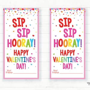 May include: Two pink printable Valentine's Day cards with a rainbow design. The text on the cards reads "Sip, Sip Hooray! Happy Valentine's Day!" with space for a name at the bottom.