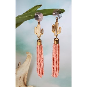 Gouden en roze cactusdruppels