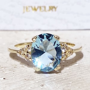 Anillo de aguamarina - Piedra natal de marzo - Anillo llamativo - Anillo de oro - Anillo de compromiso - Anillo ovalado - Anillo de cóctel - Anillo de garra - Anillo azul claro