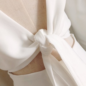 Long Sleeve Short Wedding Dress: Open Back Bow Sheath