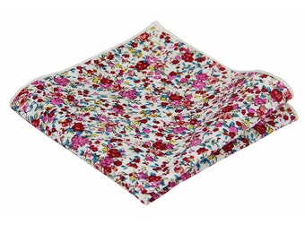 May include: A white pocket square with a small floral pattern in shades of pink, red, and yellow.