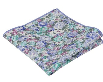 May include: A blue and white floral patterned pocket square with a light blue border.
