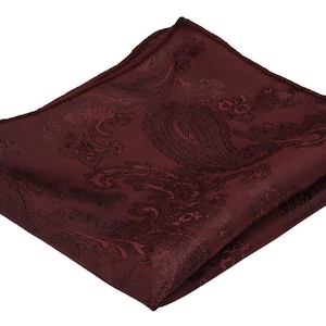 May include: A burgundy paisley pocket square with a satin finish.