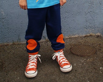 Kids baggy pants ORANGE KNEE PATCHES soft organic dark blue