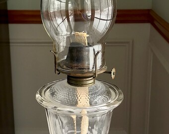 Grande lampe à huile vintage en verre transparent