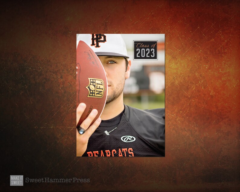 May include: A young man wearing a black jersey with the word "DEADCATS" and a white baseball cap with the letter "HP" on it. He is holding a football in front of his face. The football has the NFL logo on it. The background is a blurred image of a field. The text "Class of 2023" is in a black box with white lettering.