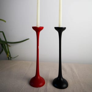 Vintage fluted red and black wooden candle holders, made in Denmark