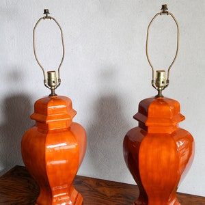 Vintage mid century orange ceramic table lamps - sold as a pair