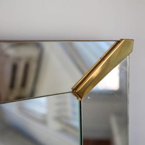 Vintage large rectangular Art Deco wall mirror with brass corners