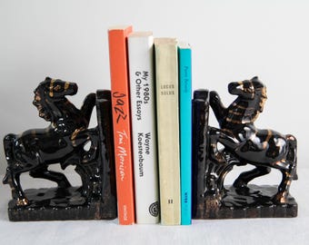 Vintage 1950s ceramic horse or zebra bookends - black and gold