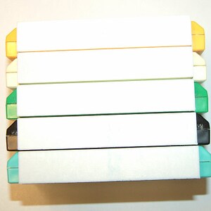 Set of five Nintendo Famicom PCB cartridge dust covers. image 4