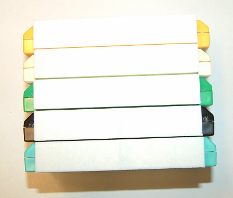 Set of five Nintendo Famicom PCB cartridge dust covers. image 4