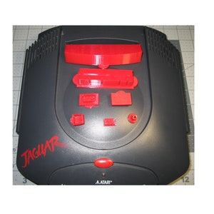 9 piece set of Atari Jaguar System port & switch dust covers Designed and Made in the USA. image 1