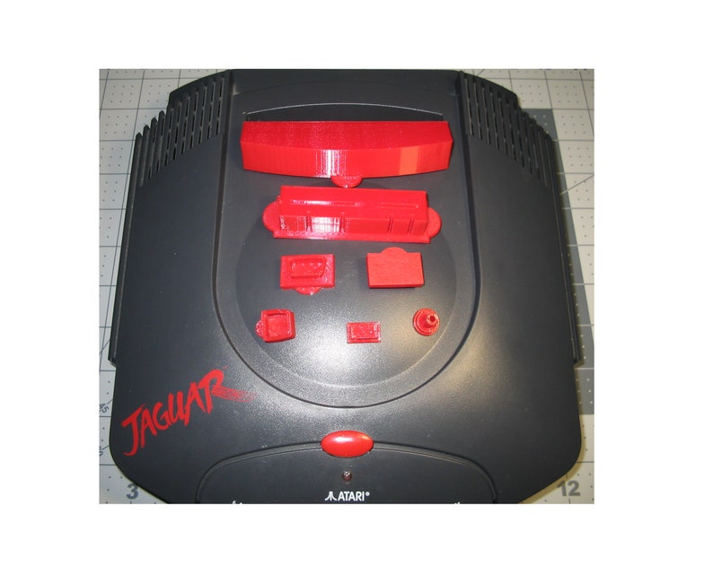 9 piece set of Atari Jaguar System port & switch dust covers Designed and Made in the USA. image 1