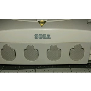 4 piece set of Sega Dreamcast Controller dust covers Designed and Made in the USA.