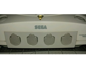 10 piece set of Sega Dreamcast port & switch dust covers Designed and Made in the USA.