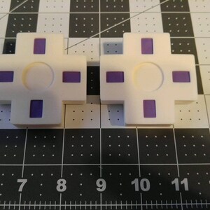 Anime video game cosplay costume purple white D Pad hair clip set.