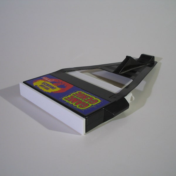 Nintendo NES Game Genie dust covers Designed and Made in the USA.