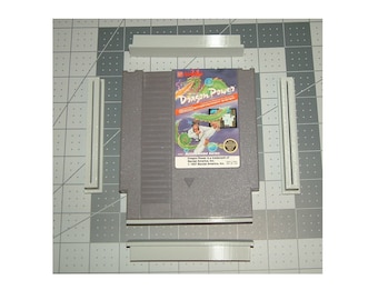 Set of five Nintendo Entertainment System cartridge PCB dust covers