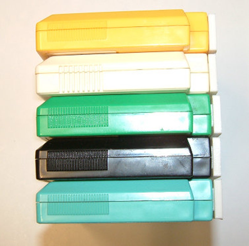 Set of five Nintendo Famicom PCB cartridge dust covers. image 3