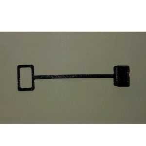 May include: A black metal key with a square head and a long handle.