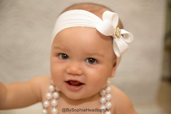 white infant headband