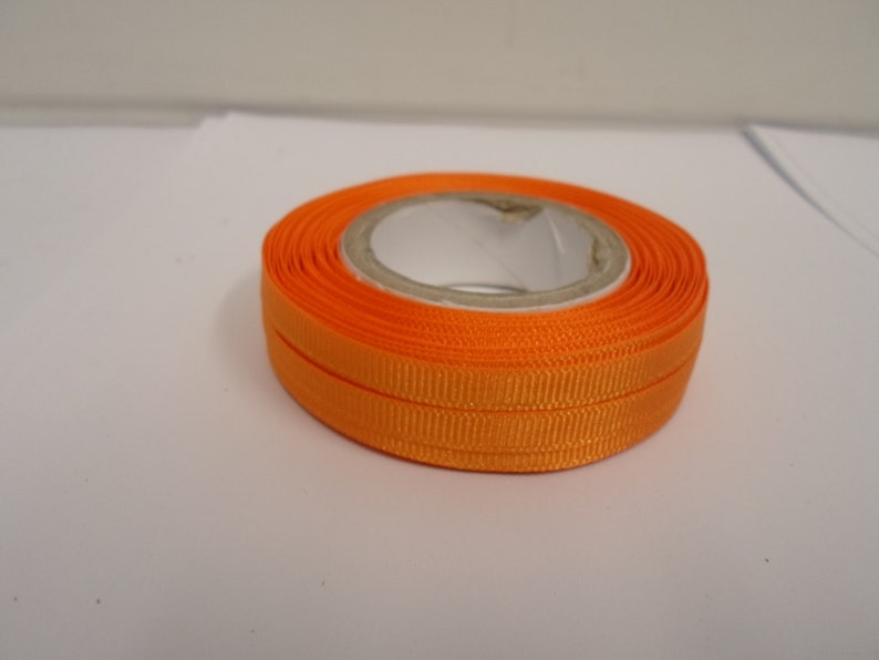 3 mm 6 mm 10 mm 16 mm 22 mm 38 mm 50 mm Pumpkin Dark Orange Grosgrain Ribbon Ribbed 3 mm 6 mm 10 mm 16 mm 22 mm 38 mm 50 mm Pumpkin Dark Orange Grosgrain Ribbon Ribbed