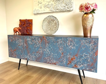 Coastal style sideboard with copper. Beach house furniture. Sea side interior.