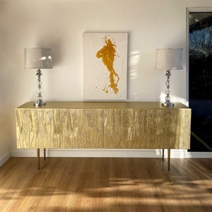 Large gold credenza. Gold sideboard textured