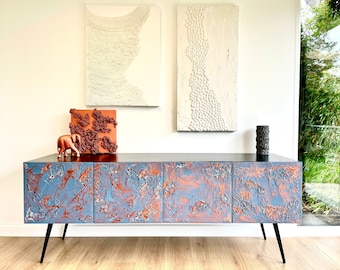 Extra long coastal style sideboard with copper. Beach house furniture. Sea side interior.