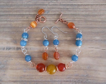 Wire wrapped set of bracelet and earrings, copper, silver and gemstones "Frozen Orange"